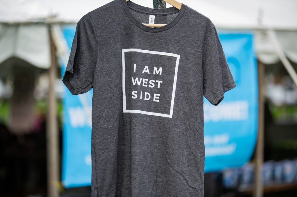 t shirt with text "I am west side"
